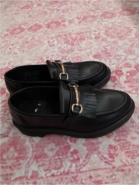 Dr. Martens Black Leather Kiltie Loafers with Gold Hardware
